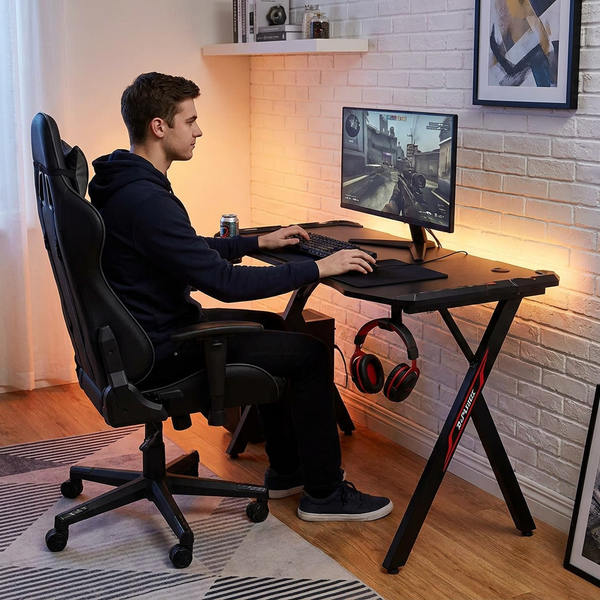 Gaming Desk Built for Extended Play, 47-Inch Surface, Carbon Fiber Accents, LED Monitor Stand, Headphone Hook